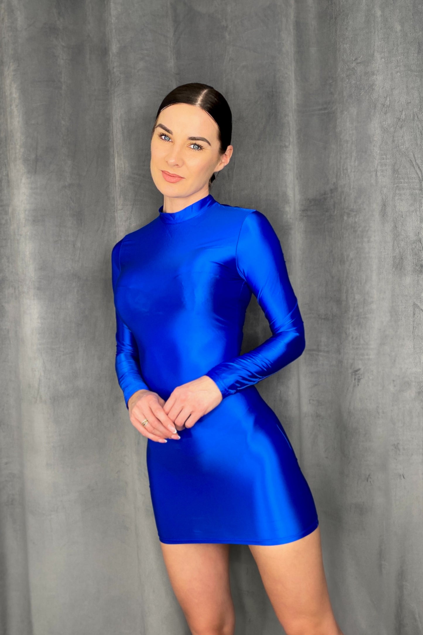 Blue spandex mini dress with high neck and long sleeves