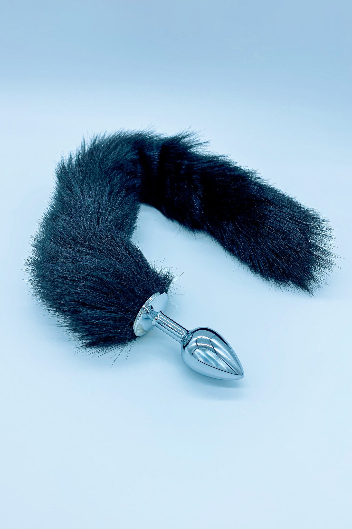 Stainless steel anal plug with faux fur tail – elegant and body-safe design