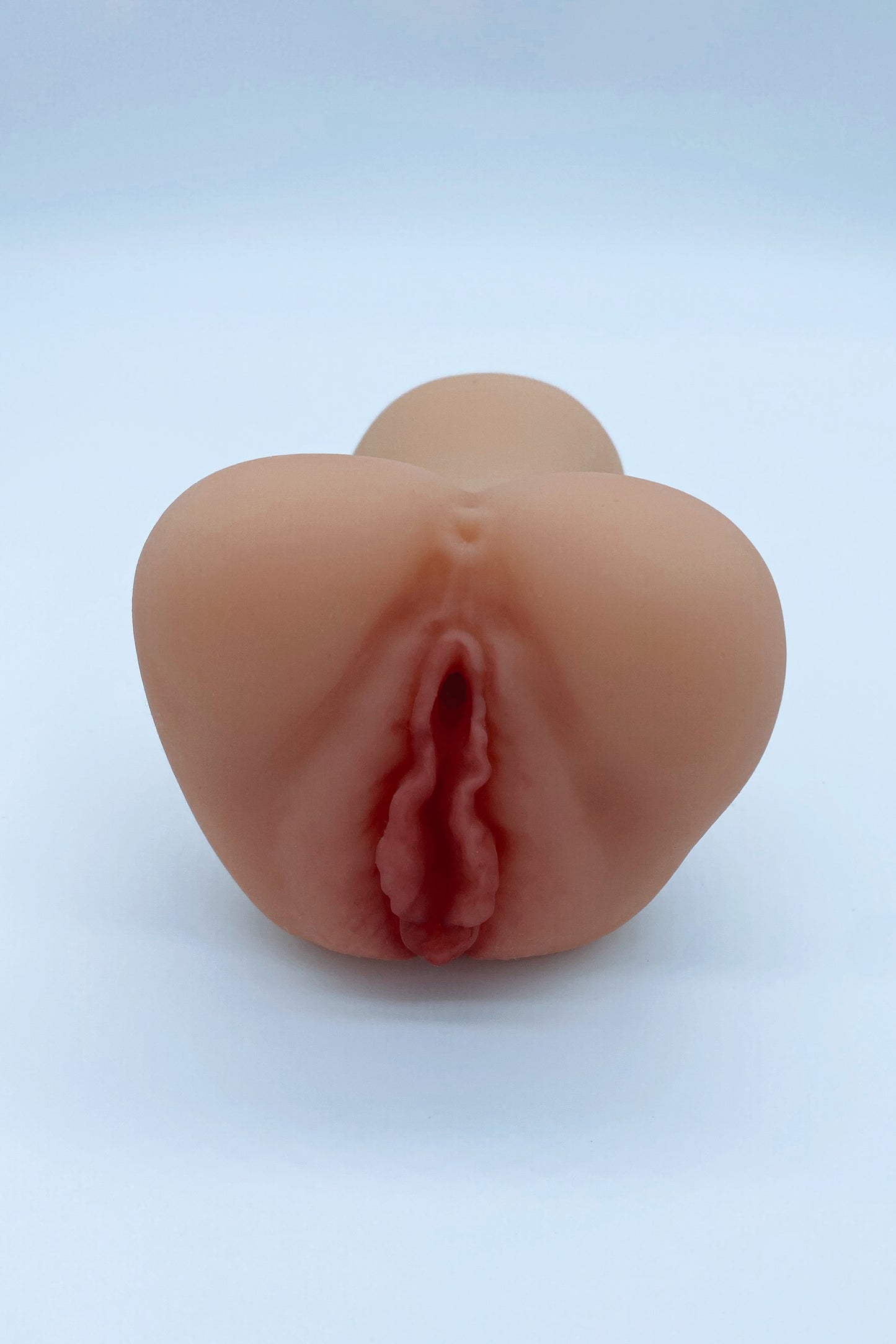 Realistic silicone masturbator – soft, flexible, and easy-to-clean with ergonomic shape