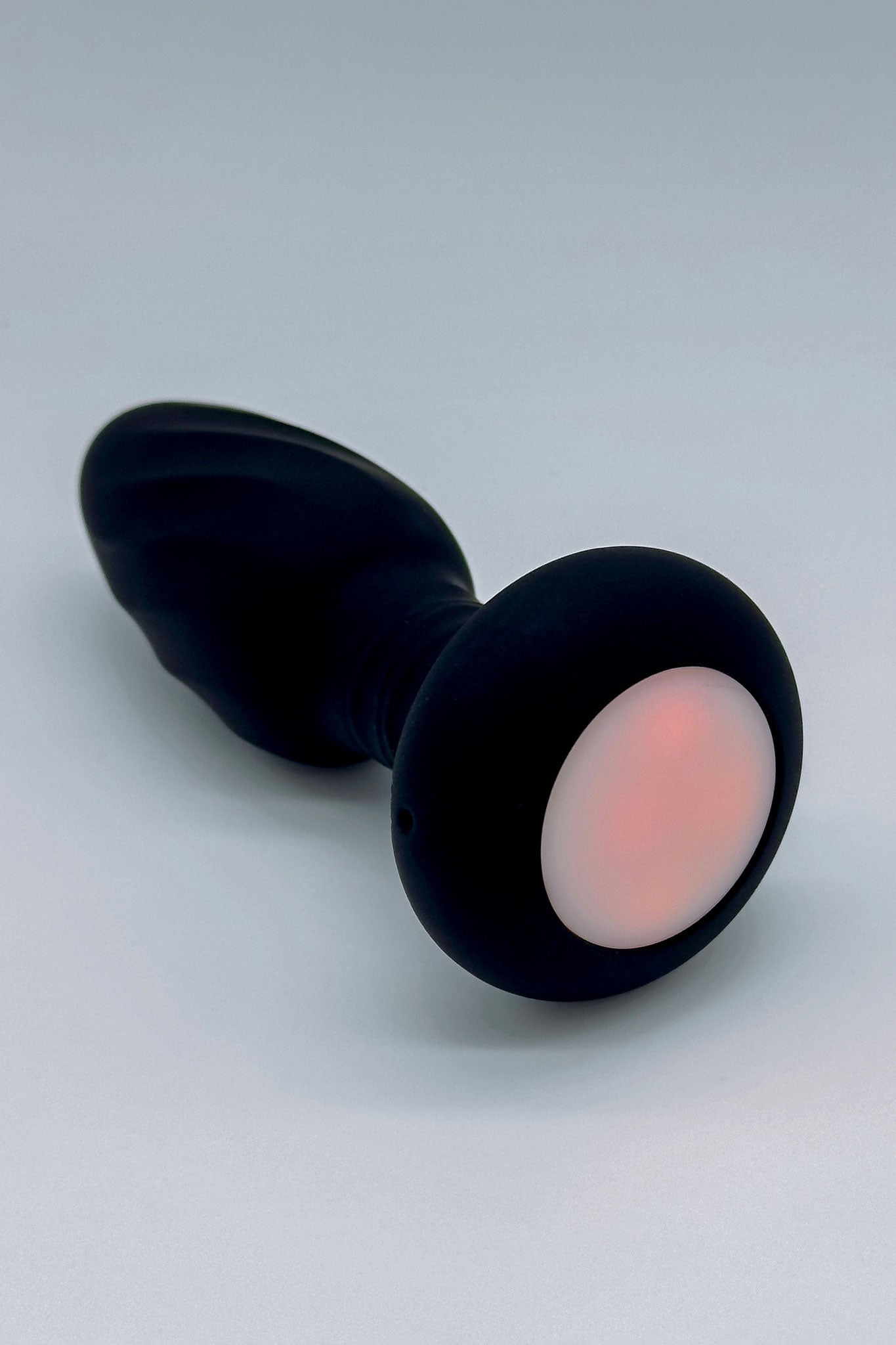 Rotating light-up anal plug with multicolor lighting effects