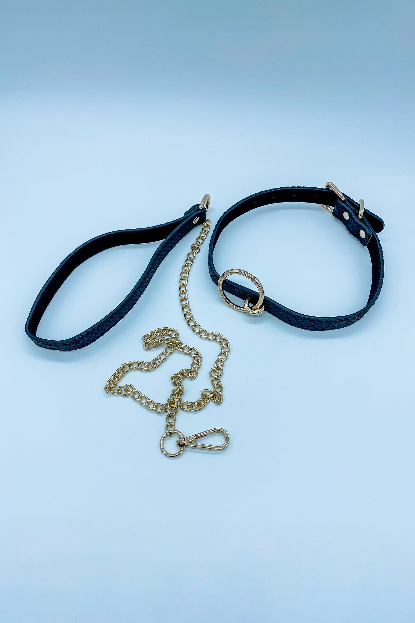 Adjustable faux leather collar with matching lead – durable and stylish for bondage play