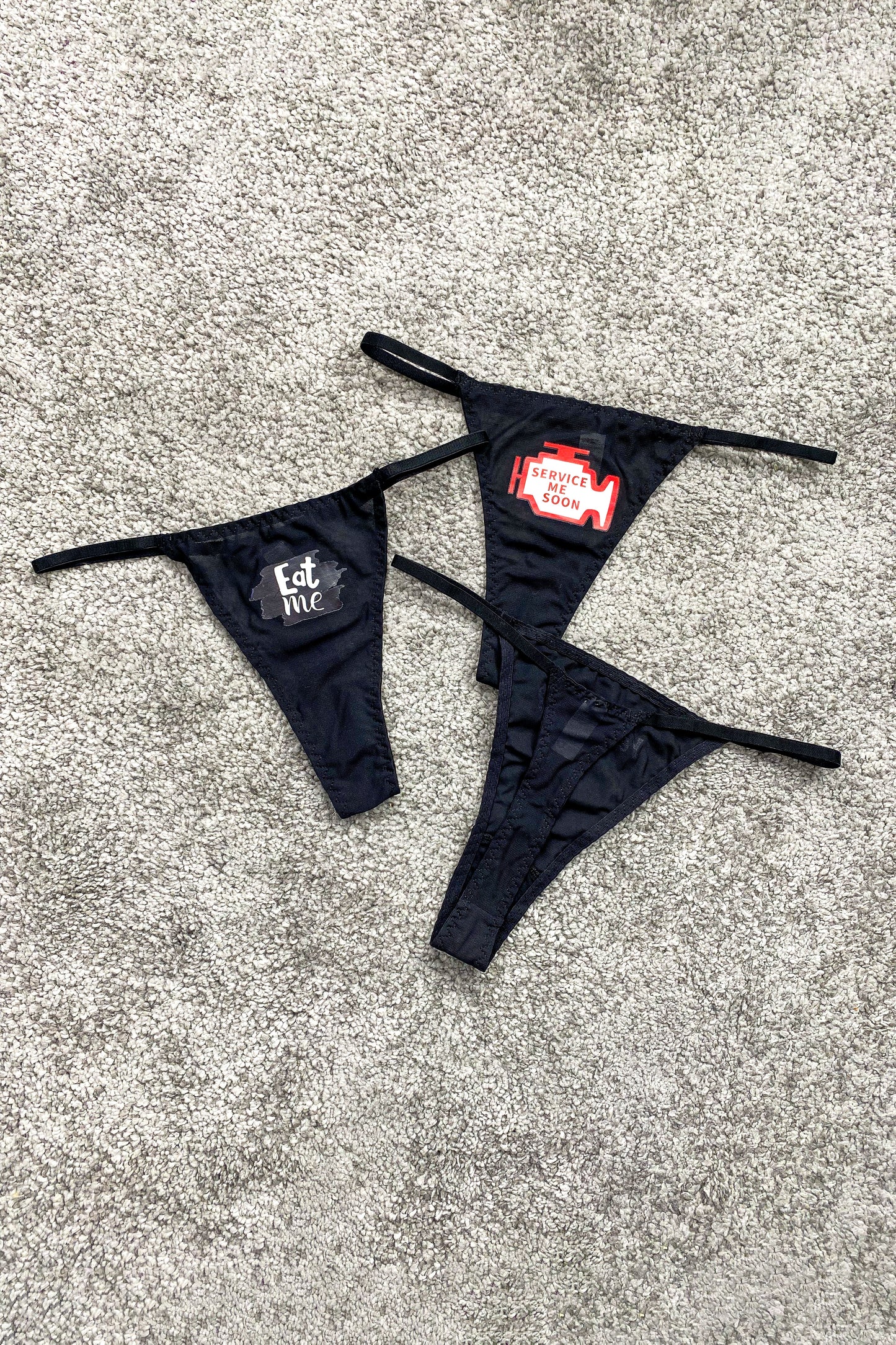 Fun novelty lingerie thong – lightweight black mesh with flirty front detail