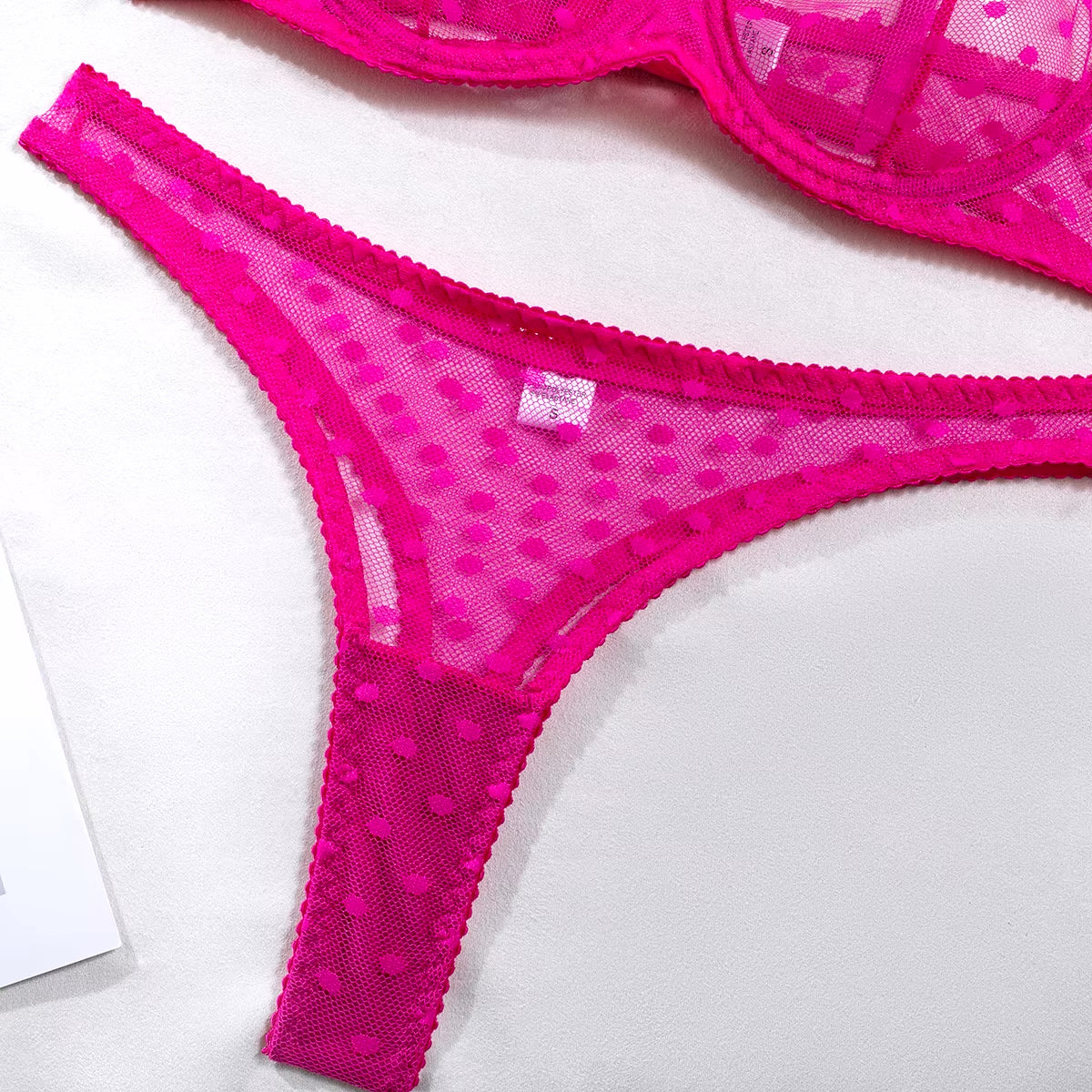Pink mesh thong with dot pattern and seamless flattering fit