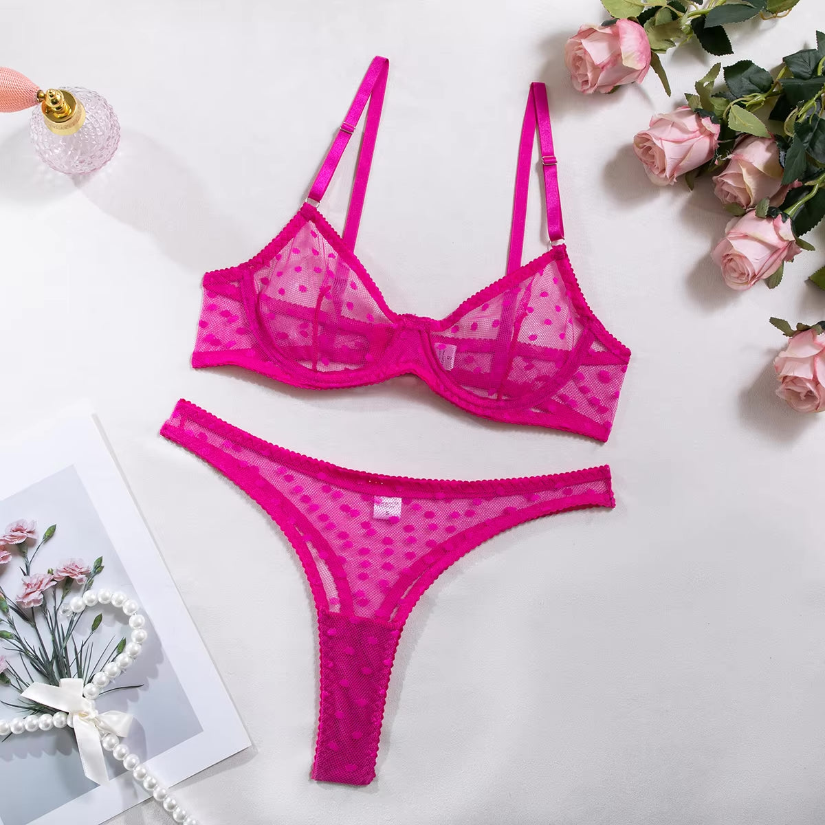 Pink mesh lingerie set featuring underwire bra and seamless thong