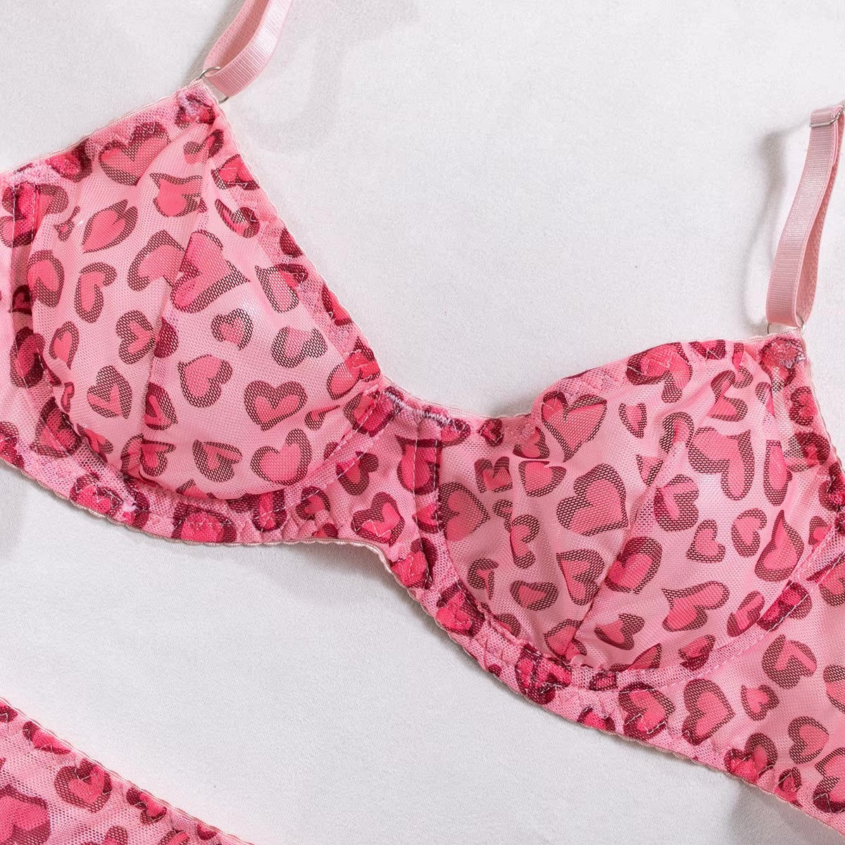 Pink heart mesh underwired bra with lift and delicate detailing