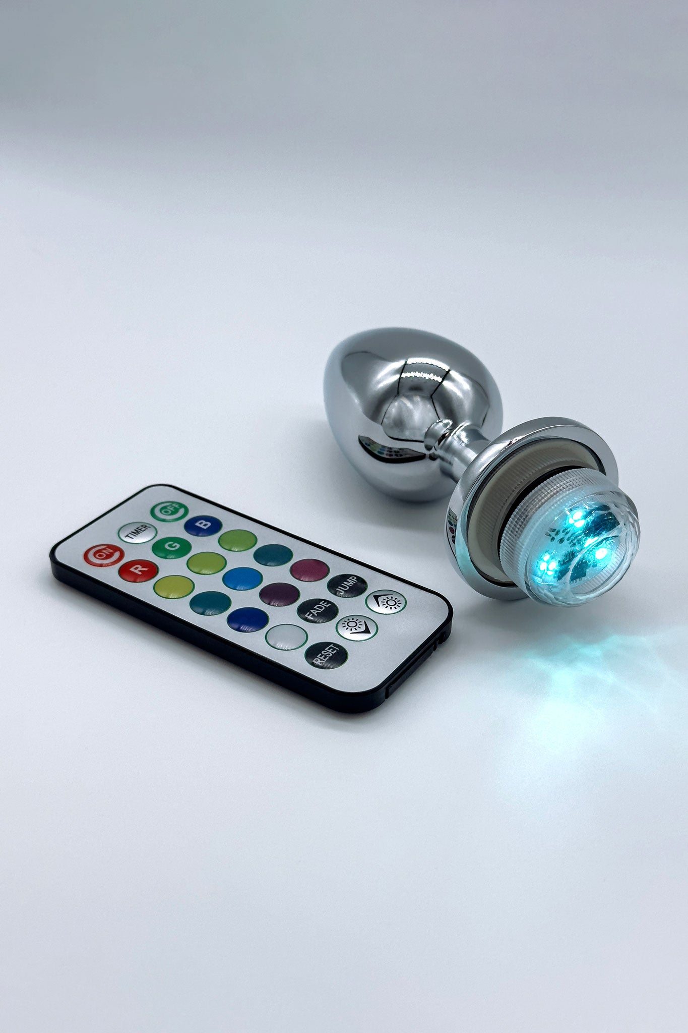 Stainless steel light-up butt plug with wireless remote, battery-operated