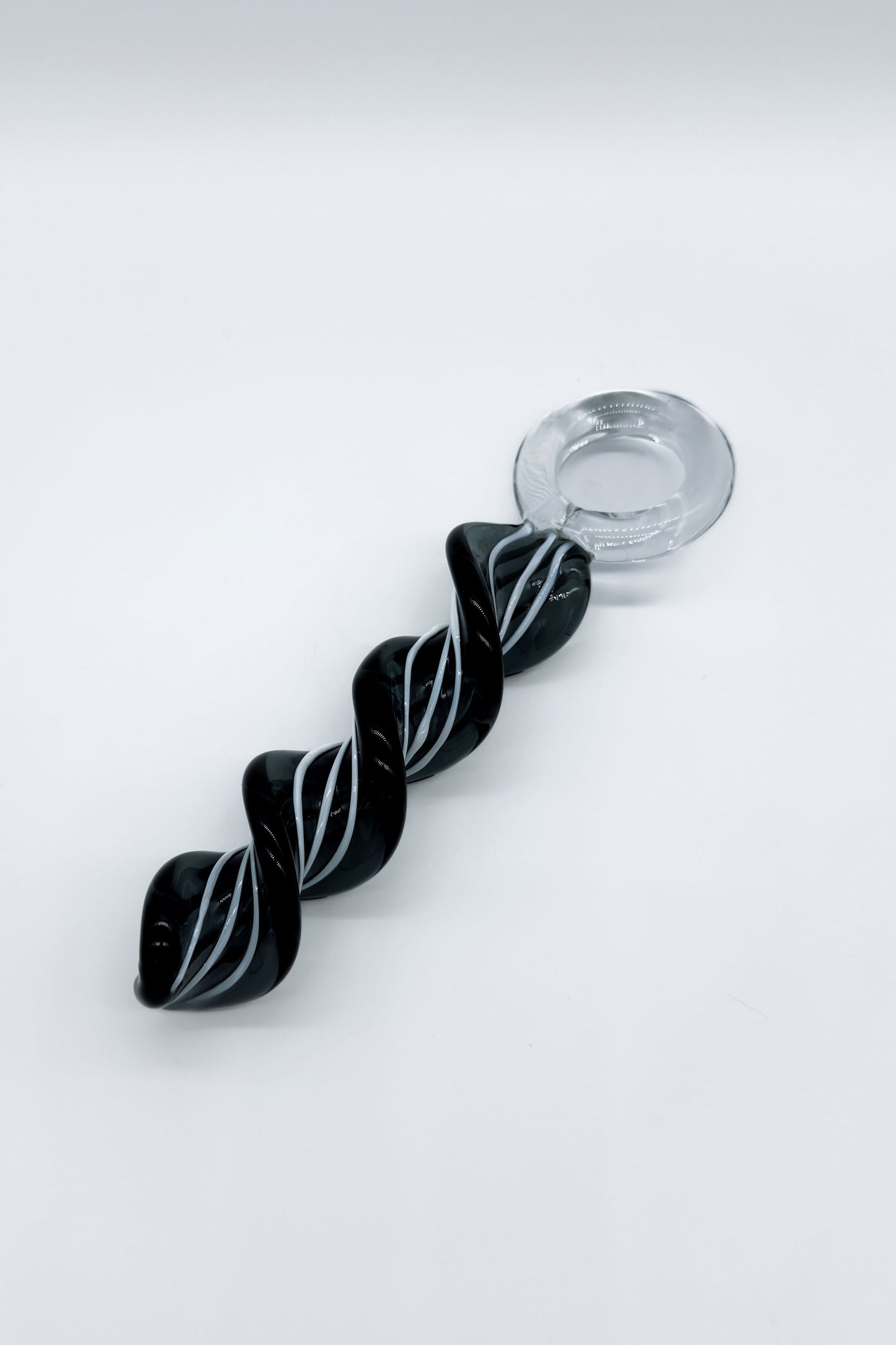Clear spiral glass plug showing smooth curved design