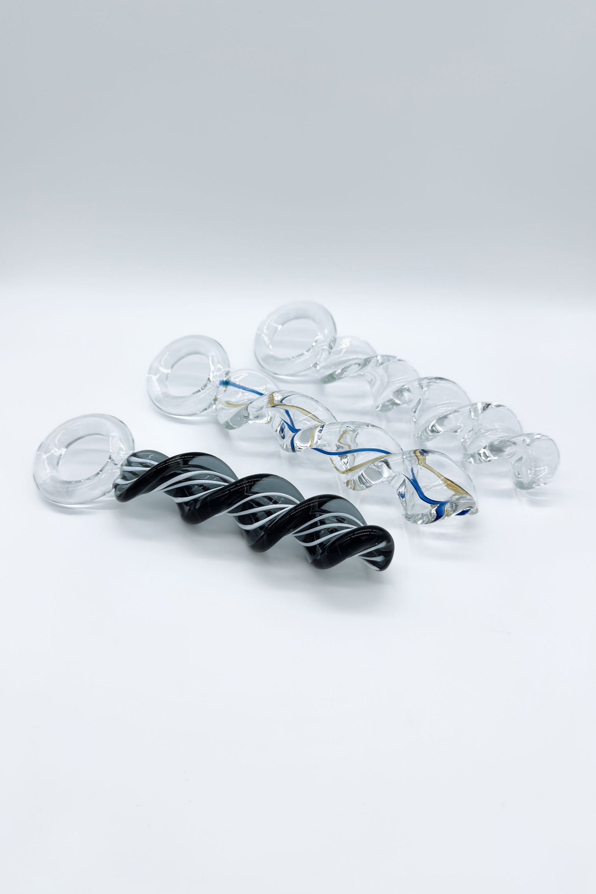 Clear twisted glass butt plug made from body safe crystal glass