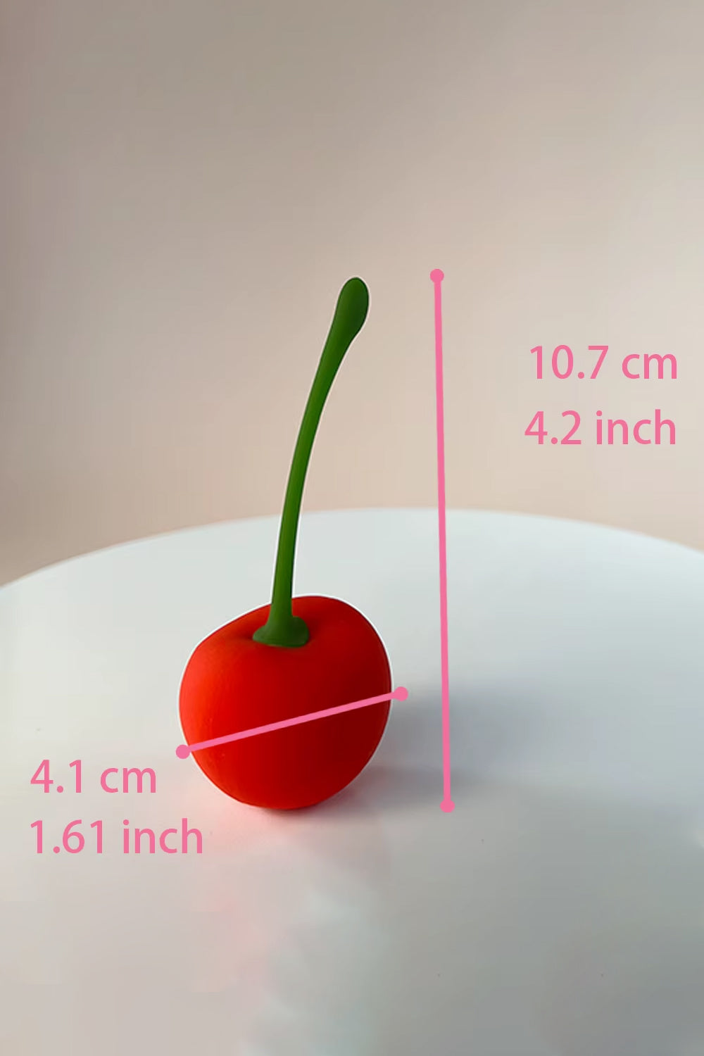 Discreet cherry vibrator egg for travel made from soft silicone