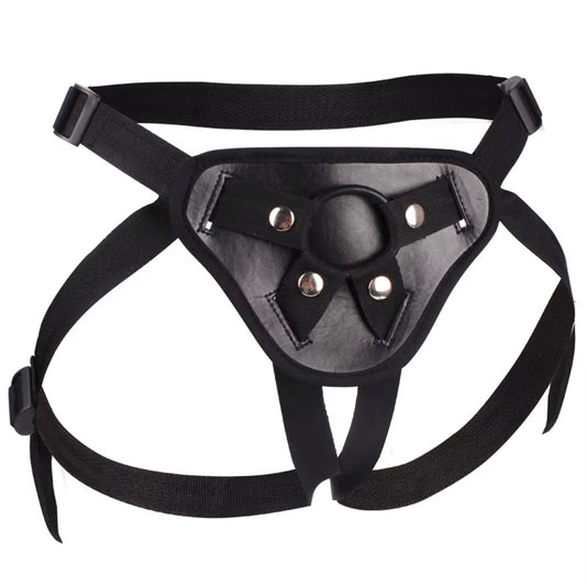  Strap-on harness with interchangeable rings and secure waistband design
