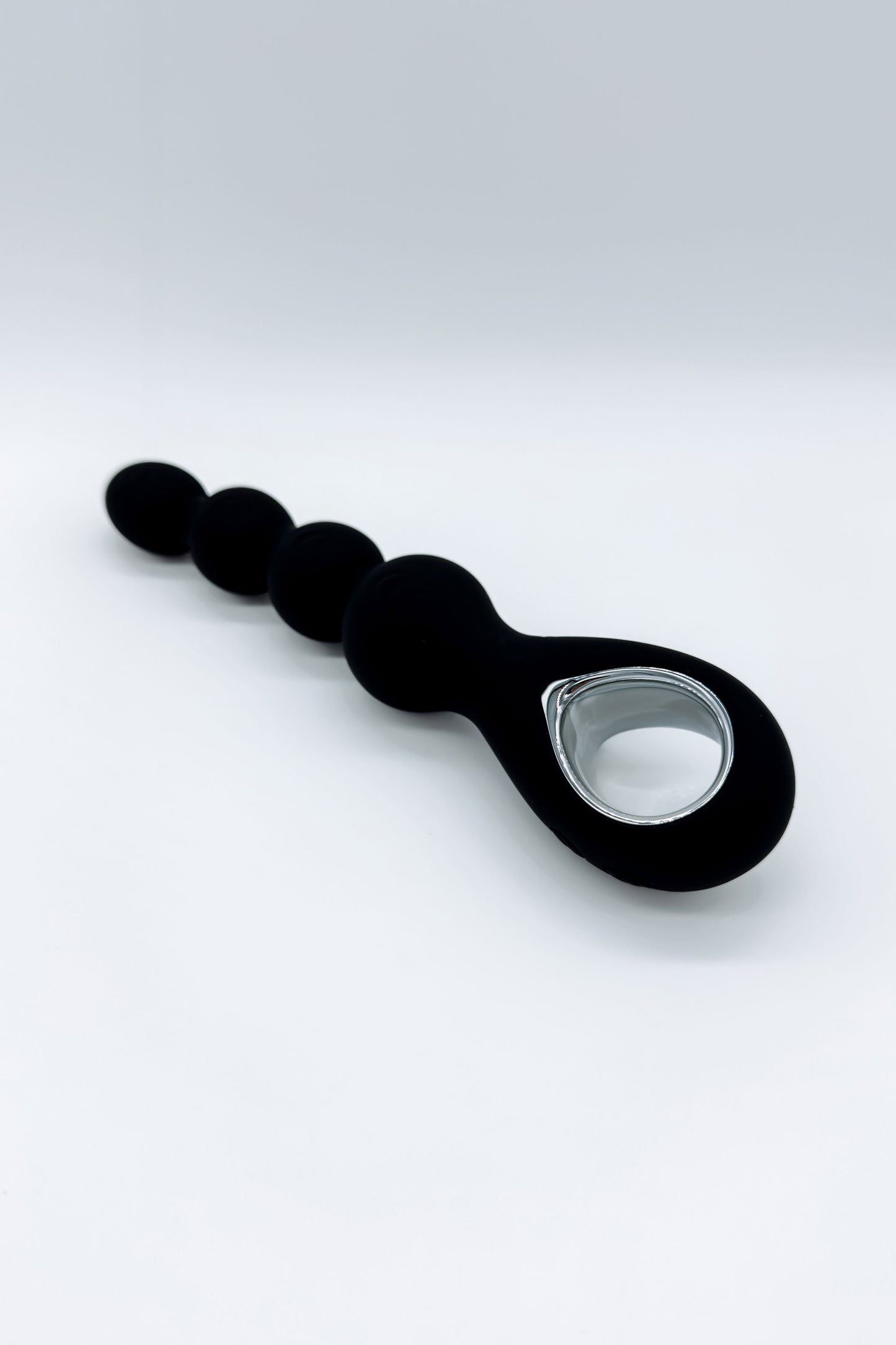 Body-safe silicone anal plug with rotation