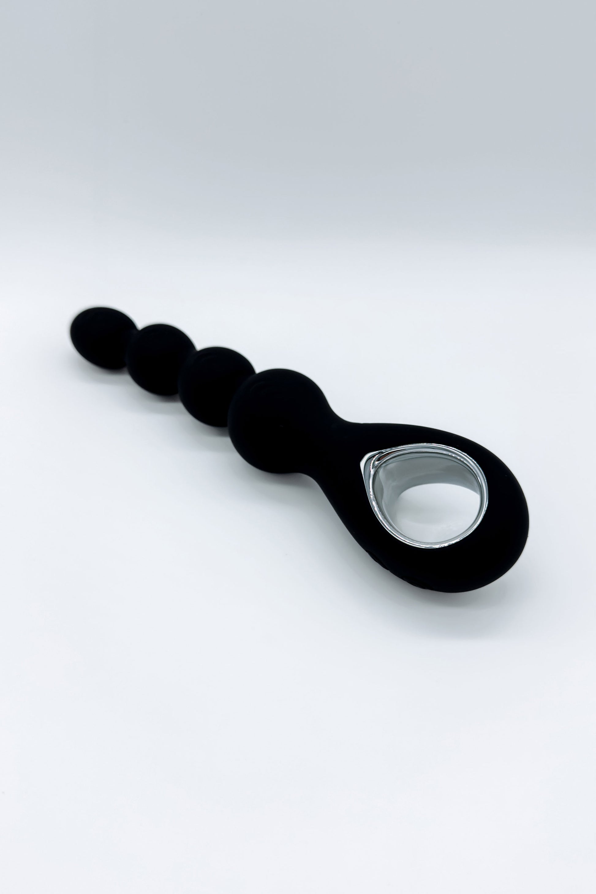 Body-safe silicone anal plug with rotation
