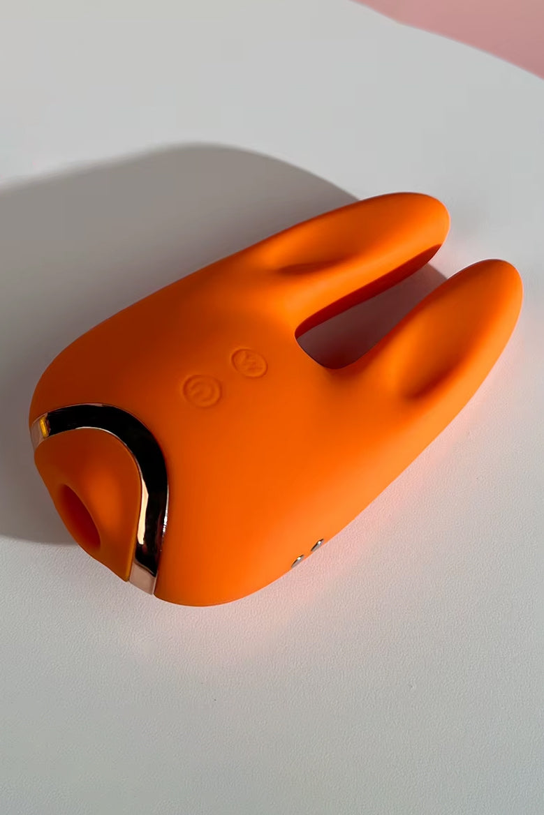 Rabbit ear vibrator with vibration and suction modes, waterproof body-safe silicone