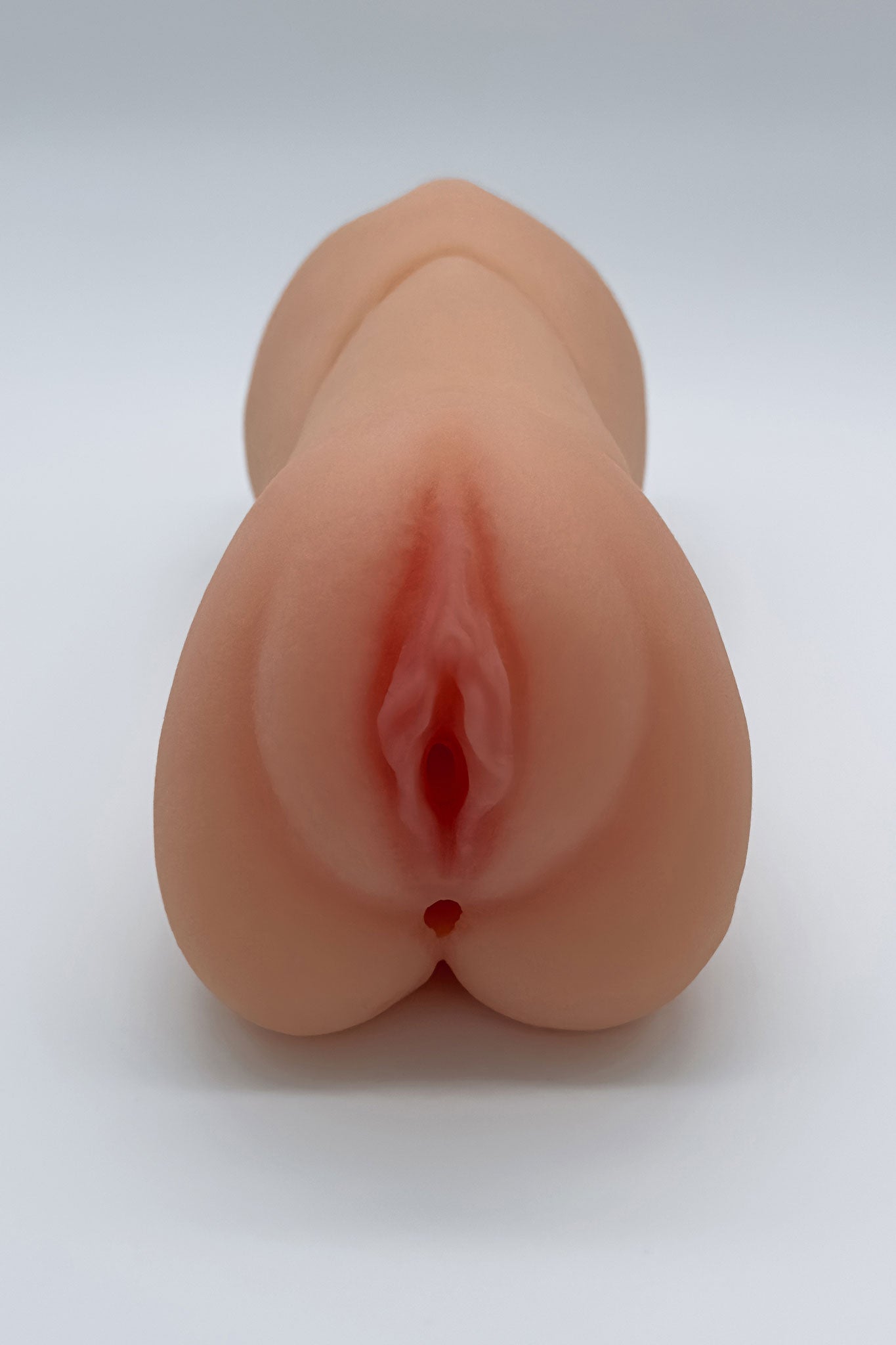 Detailed view of 3 in 1 male realistic sex toy