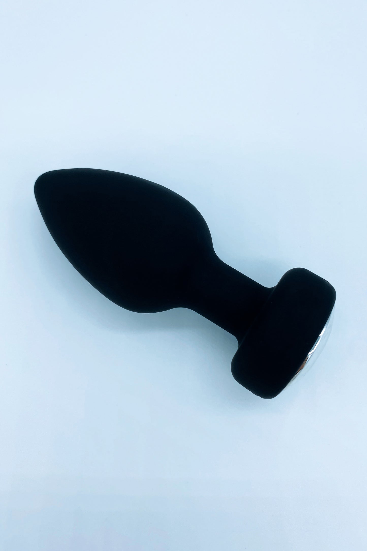 Different angles of the 10-speed butt plug showcasing its design, waterproof feature, and remote control compatibility
