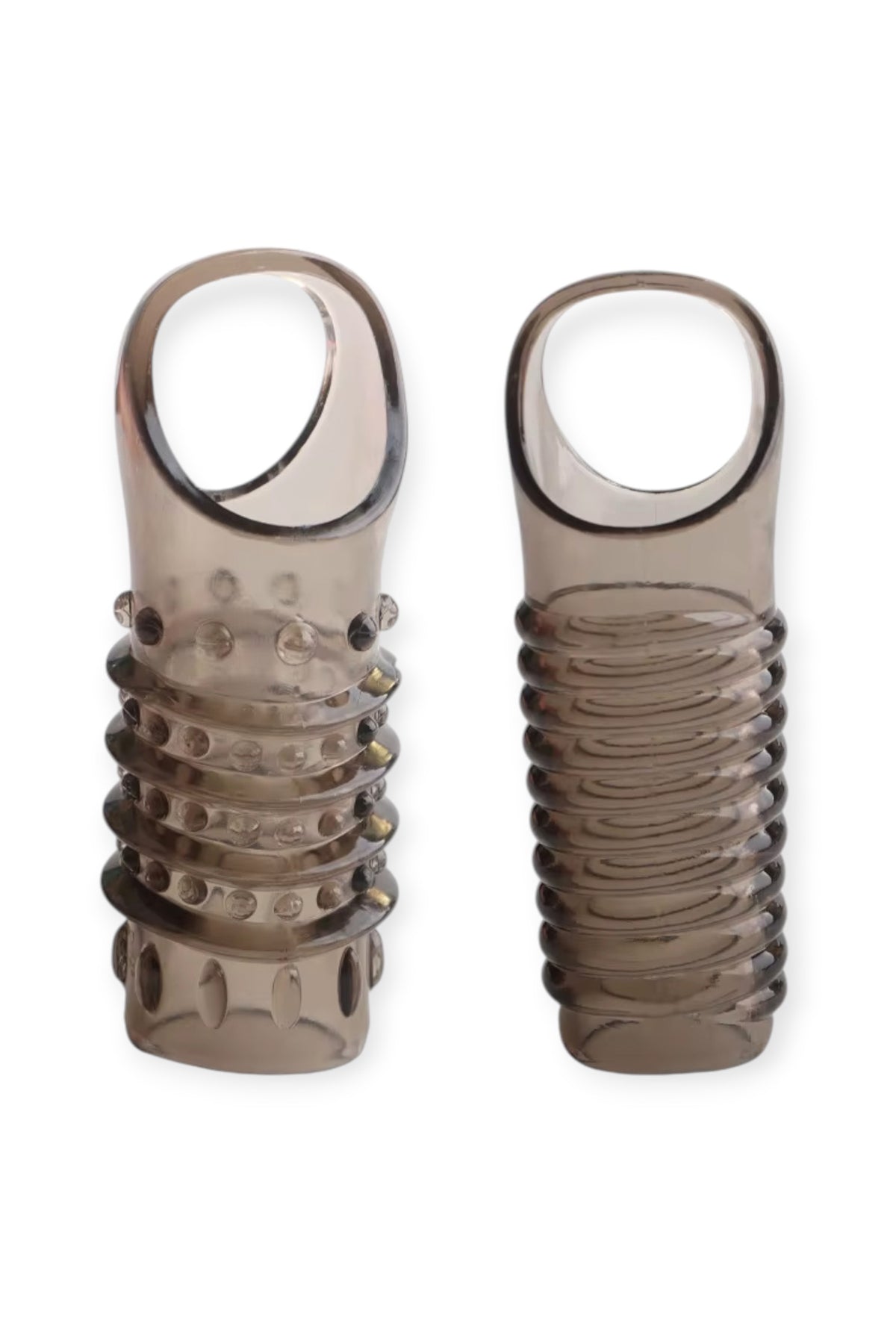 Ribbed and textured penis sleeve set in black finish with testicular ring