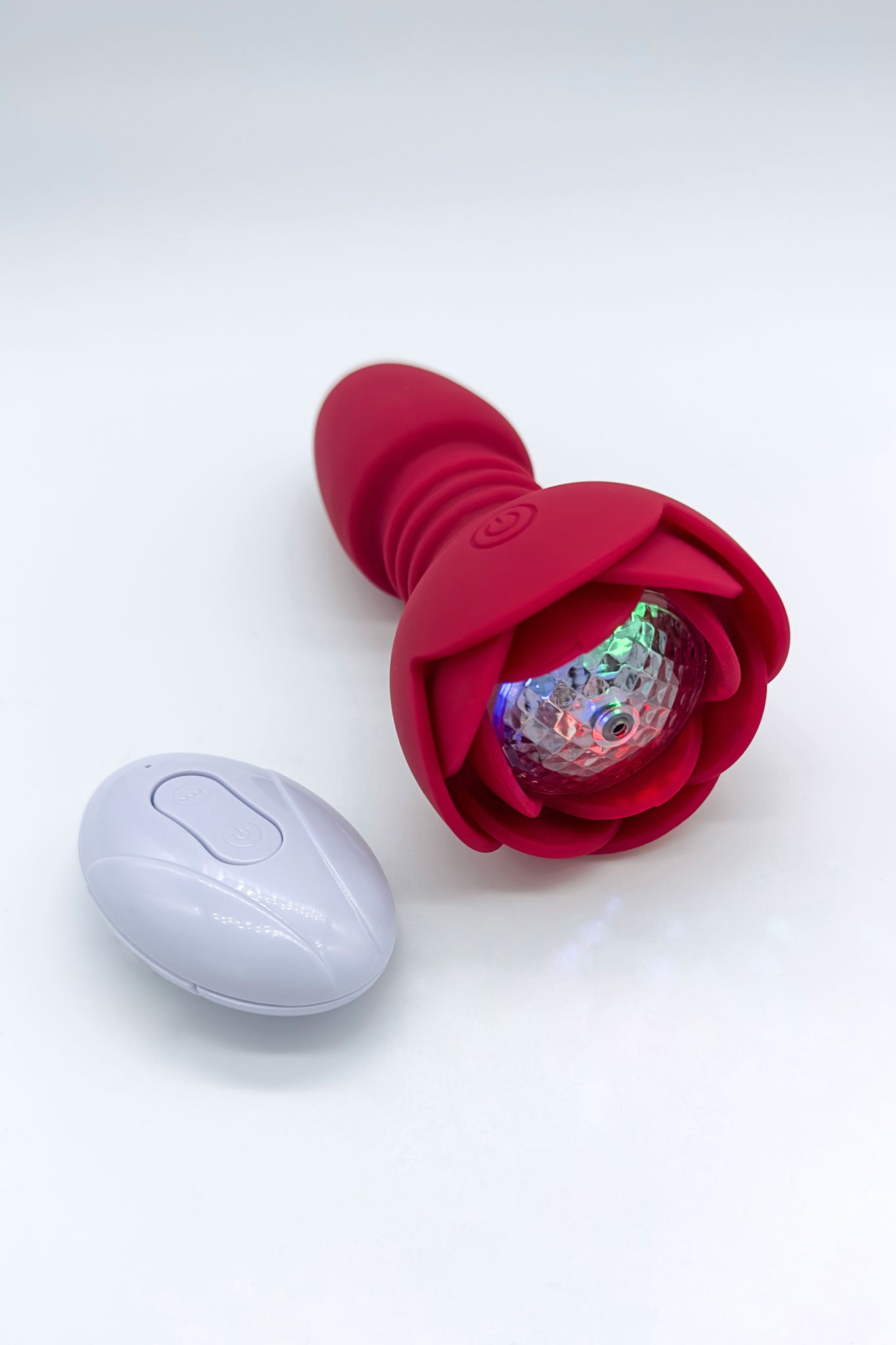 Red rose-shaped light-up anal plug with app and remote control