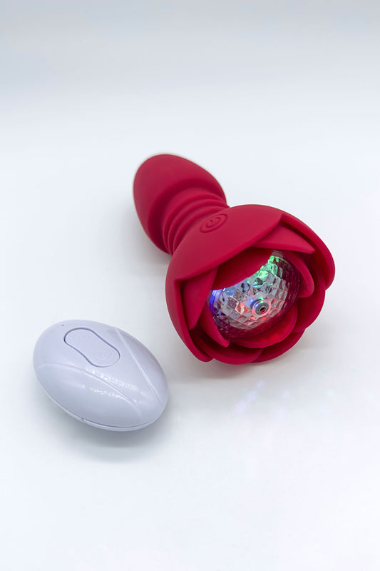 Red rose-shaped light-up anal plug with app and remote control