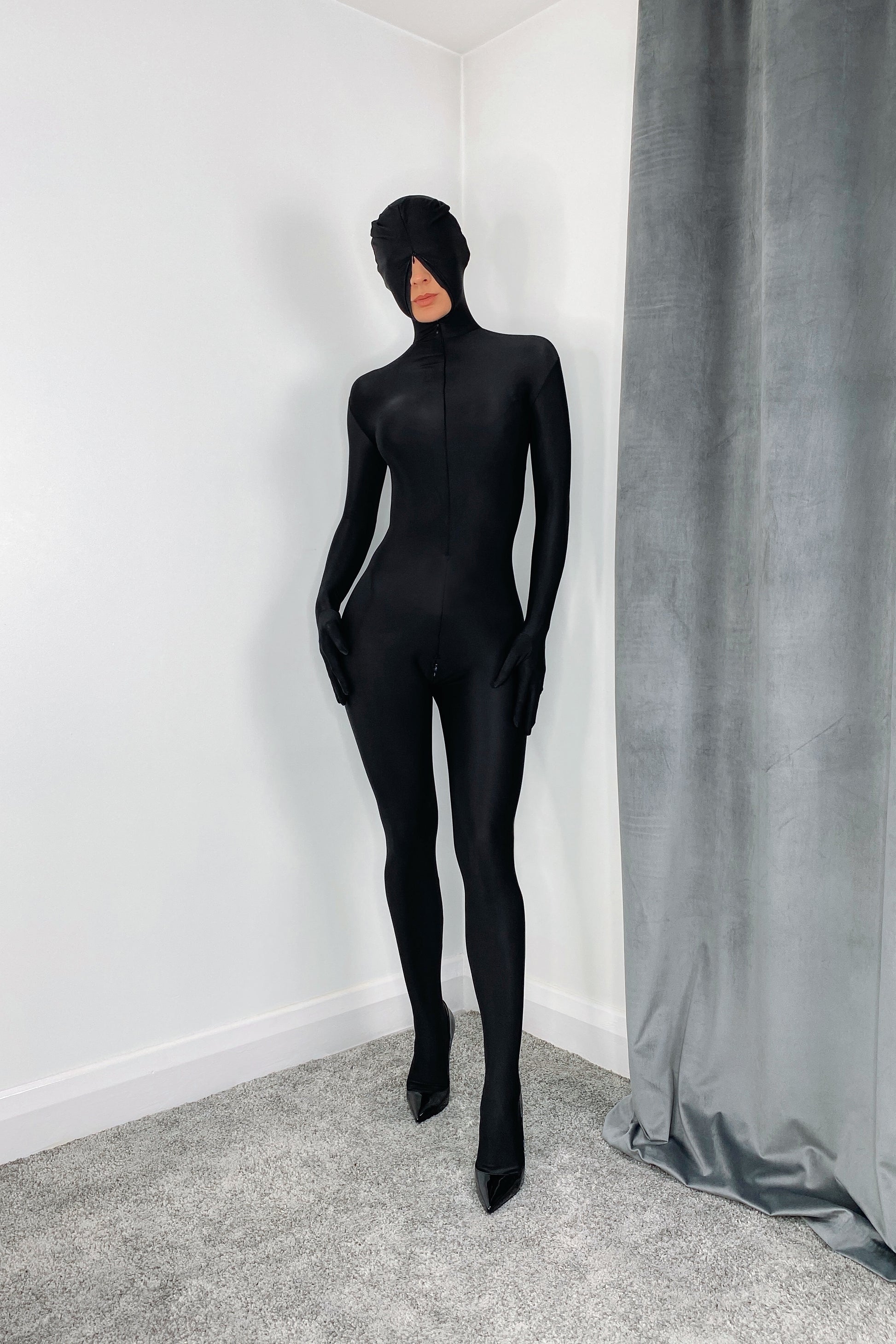 Sleek black spandex bodystocking with gloves and hood 