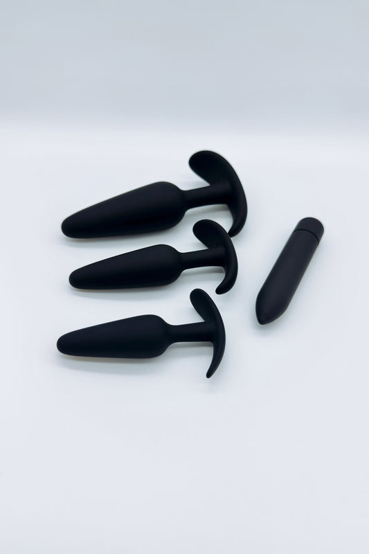 Three tapered anal plugs in small, medium, and large sizes