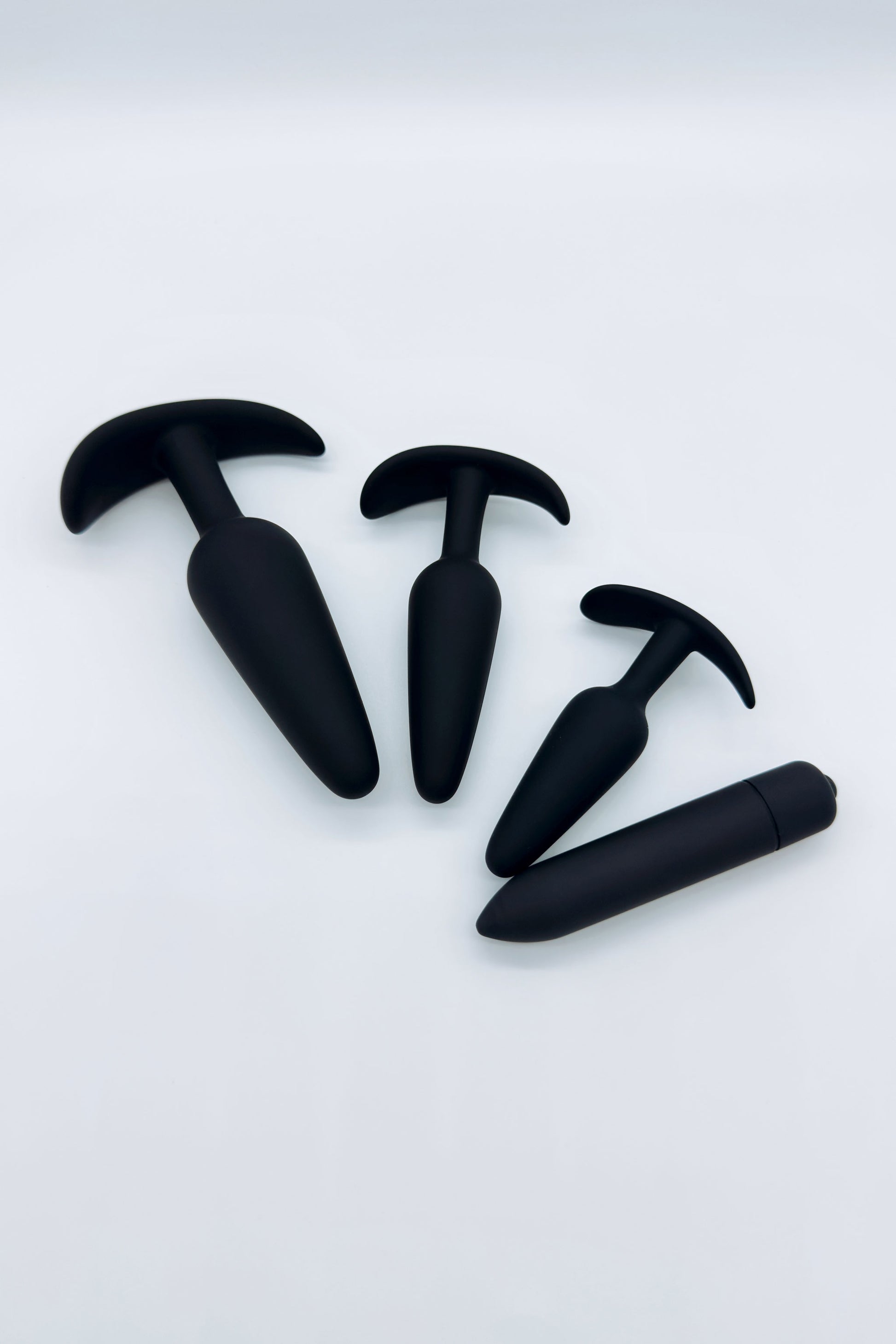 Training butt plug set and mini bullet