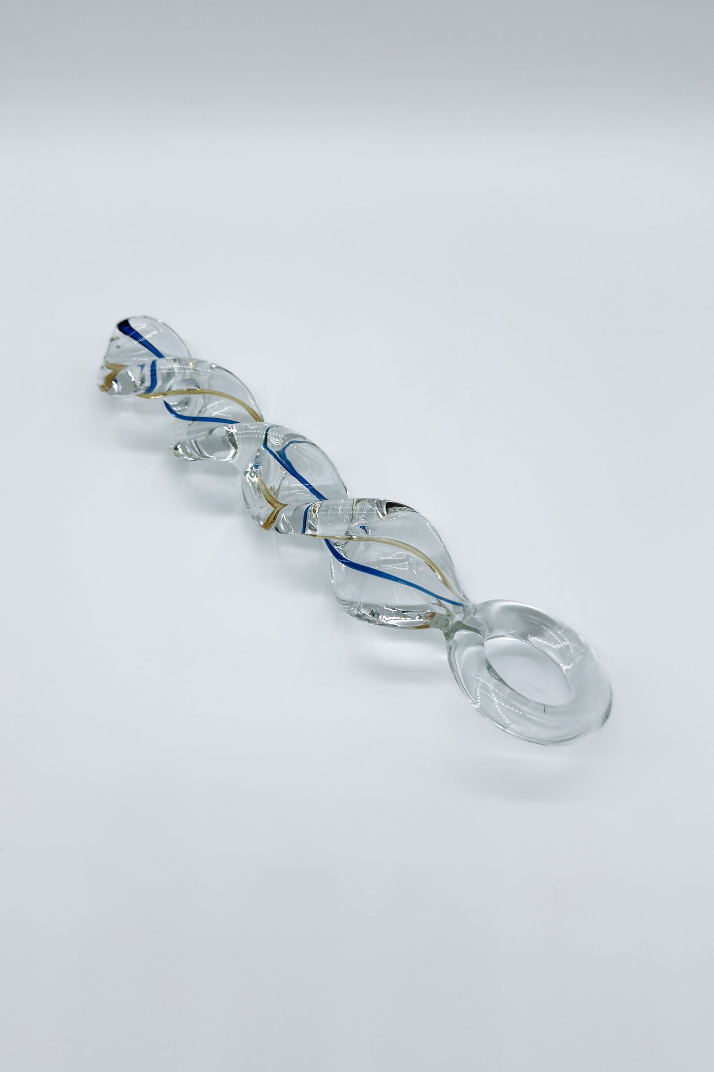 Transparent crystal glass butt plug with twisted design